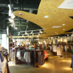 The cloud element defines circulation and draws visitors further into the store