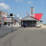 The building is between the often harsh beach and ocean and the chaotic and often crowded boardwalk.
