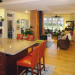 The wood stove in the center of the home provides all of the heat for the house